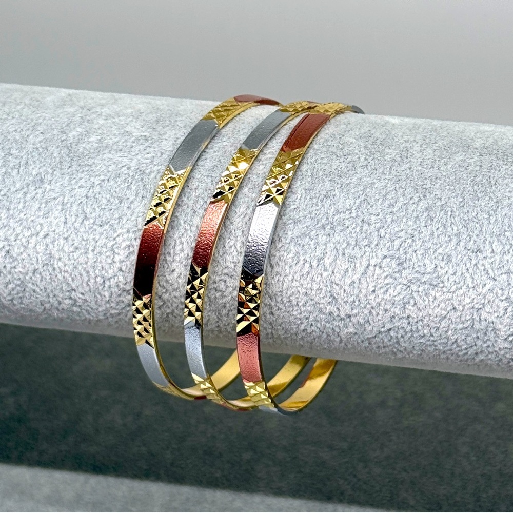 Gold plated bangles / bracelets, set of 3
8.5” 
New, Never worn